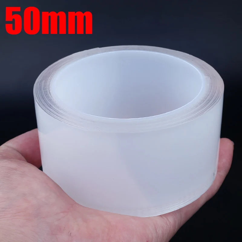 50mm wide transparent car door sill protector film roll held in hand with red label highlighting size