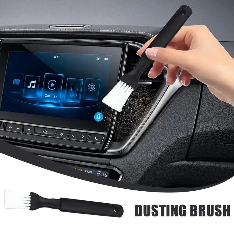Close-up of dual-head vent dusting brush with microfiber and bristle combo
