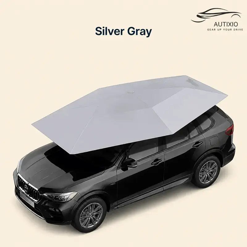 Automatic car umbrella silver gray color variant fully deployed on black SUV aerial view showing complete roof coverage