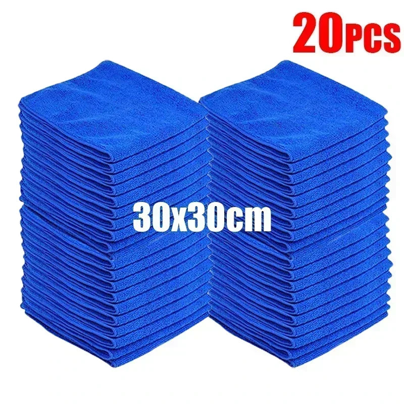 20 blue cleaning cloths stacked together with dimensions 30x30cm on a white background.