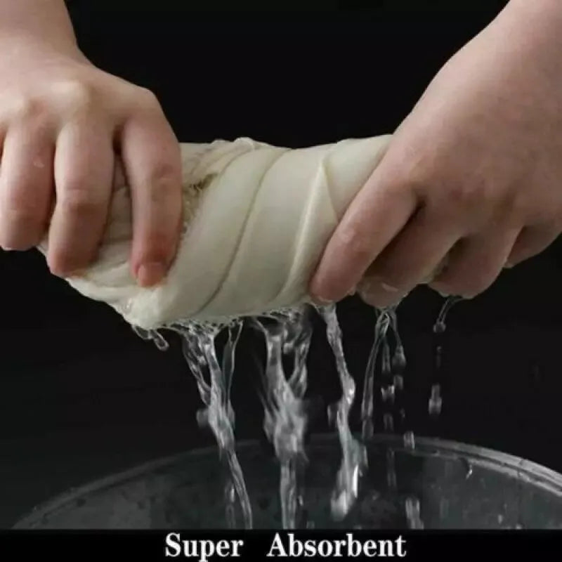 Chamois towel absorbing water in splash demonstration