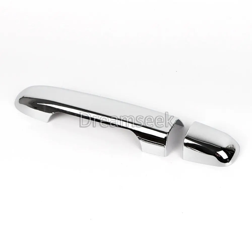 Top view of chrome door handle cover aligned over existing Hyundai handle