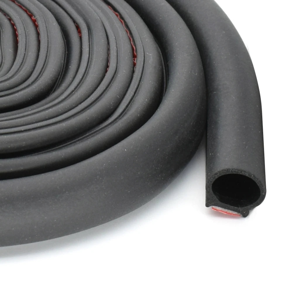 self-adhesive D-type door seal strip being applied to car edge