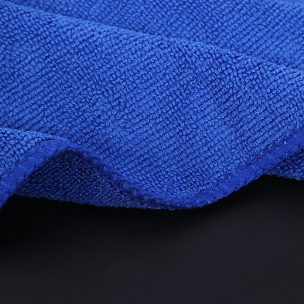 Towel cleaning car dashboard and glass surfaces – lint-free and soft