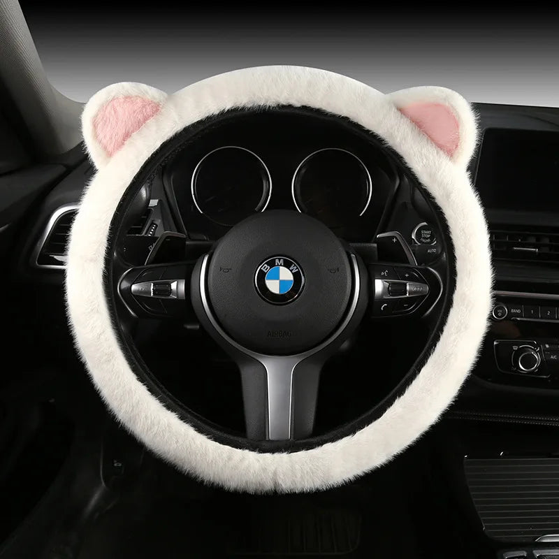 Plush cat ear steering wheel cover white with pink-lined cat ears installed on BMW steering wheel