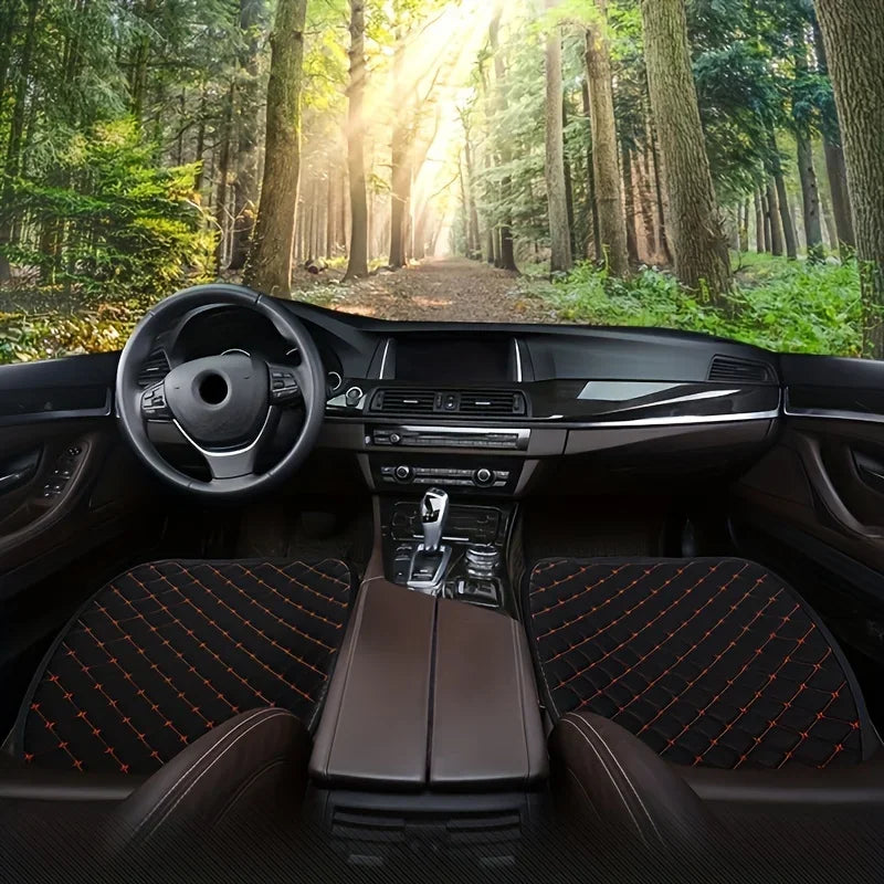 Full car interior with universal seat cushions installed on front and rear seats