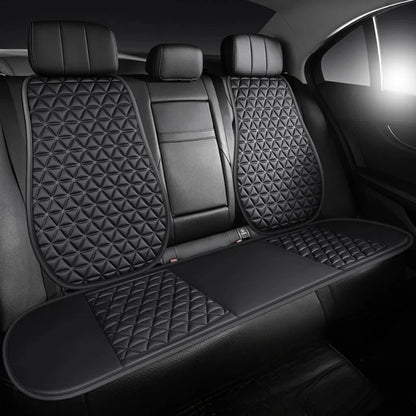 3D breathable car seat cover black installed on rear bench seat with diamond quilted pattern in luxury sedan interior