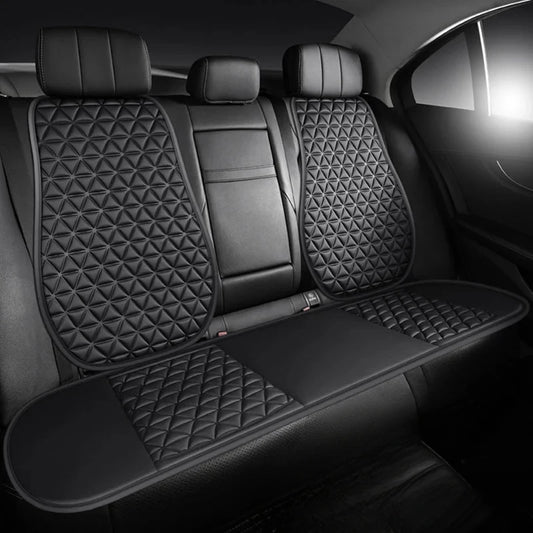 3D breathable car seat cover black installed on rear bench seat with diamond quilted pattern in luxury sedan interior