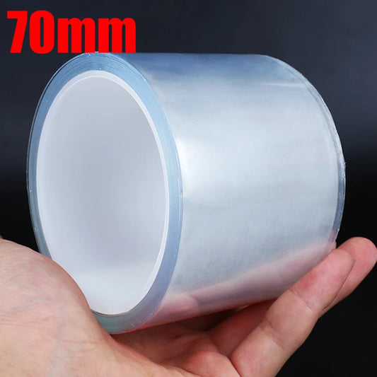 70mm wide transparent car door sill protection film roll held in hand for size reference