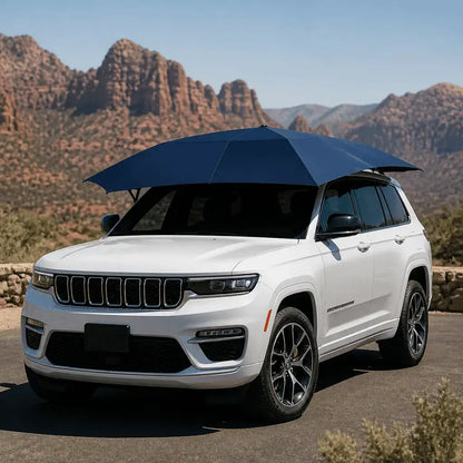 Automatic car umbrella navy blue deployed on white Jeep Grand Cherokee SUV with scenic red rock desert mountain backdrop