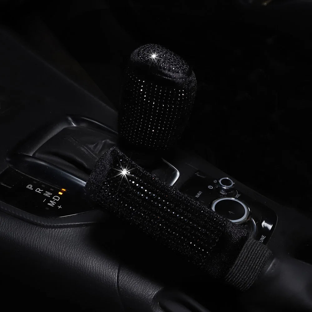 Black bling diamond rhinestone handbrake and gear shift cover 2pc set installed on car center console showing sparkling crystal finish on both gear knob and handbrake covers