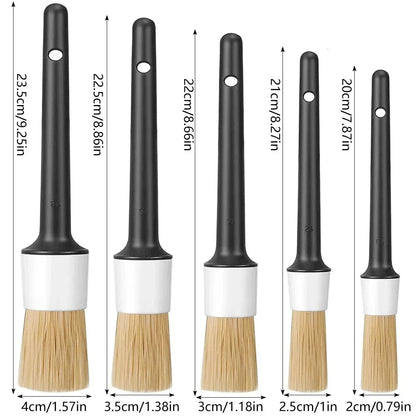 Five car detailing brushes in graduated sizes 20cm to 23.5cm