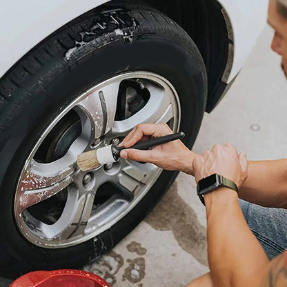 Car detailing brush cleaning soapy alloy wheel rim