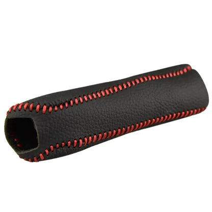 Car handbrake cover black PU leather with red hand stitching product shot on white background showing textured grip surface and open-ended tubular design