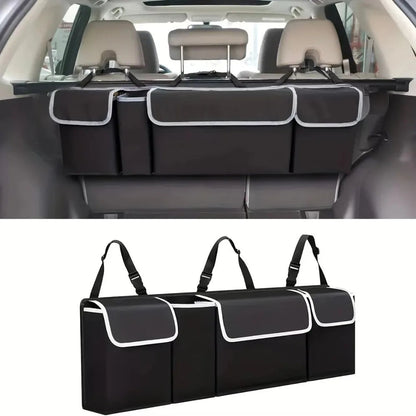 Car hanging organizer bag installed on rear seats in beige interior