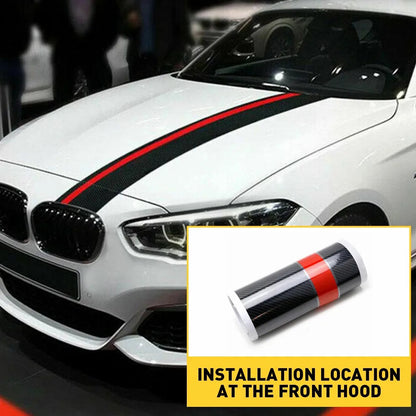 Carbon fiber racing stripe decal installed along full length of white BMW front hood with rolled product inset