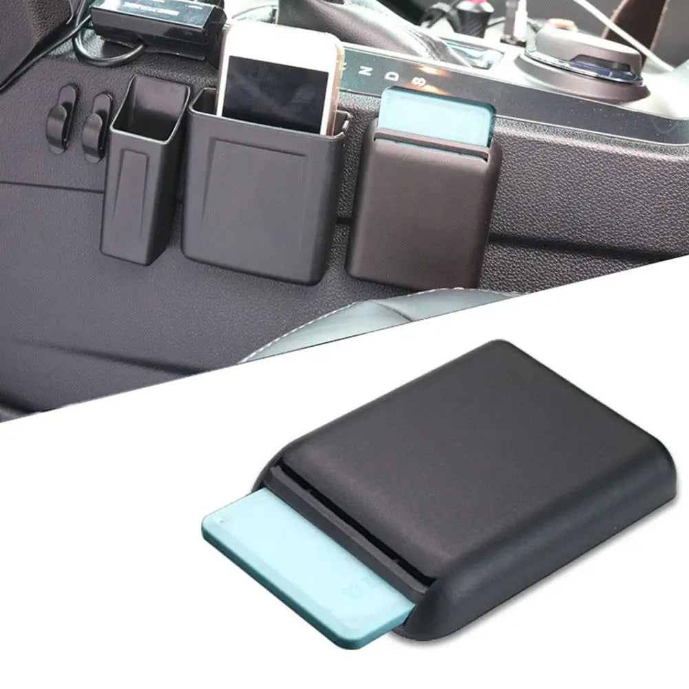 Car registration storage box with card sliding out and multiple units on center console