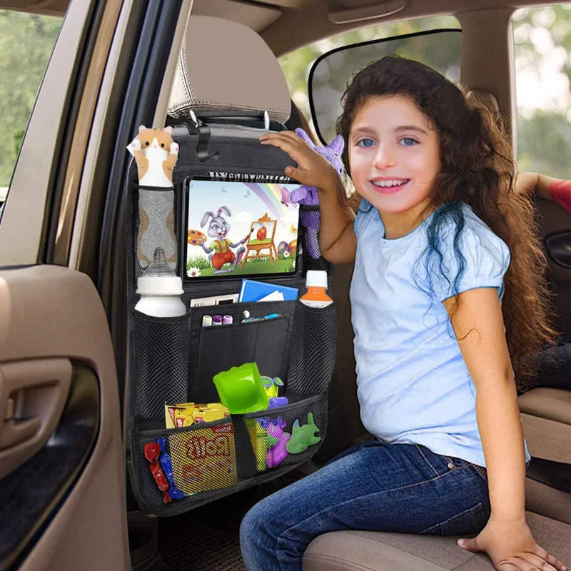 Dedicated tablet holder compartment on car seat back cover protector