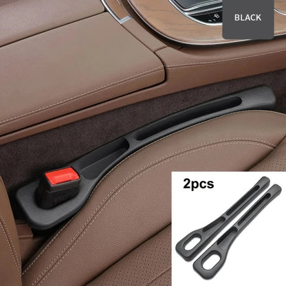 Black car seat gap filler 2pcs set installed in tan leather seat interior