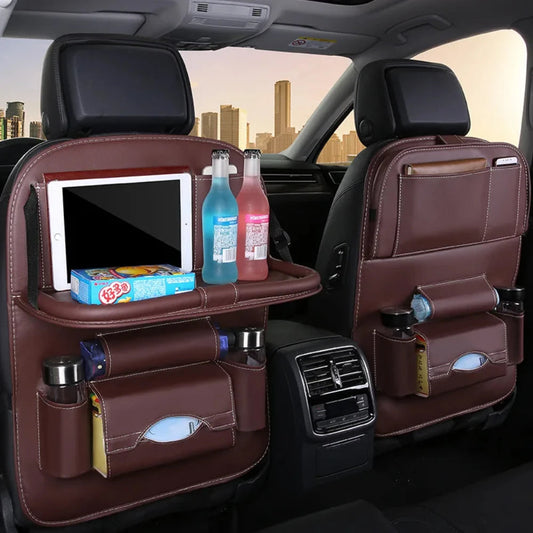 Front angle view of car seat tray table showing storage compartments