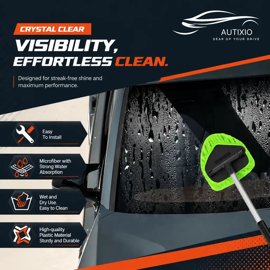 The green microfiber head from this car windshield cleaning kit wiping a water-covered, fogged windshield. It handles wet and dry passes alike and leaves not a single streak behind.
