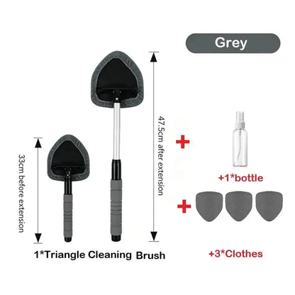 Grey 5-piece car windshield cleaning kit, all components in frame: the triangle brush, extendable handle, one spray bottle, and three grey microfiber pads.