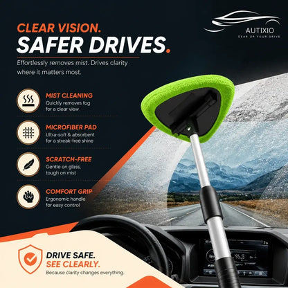 Green microfiber pad in action on a car windshield cleaning kit, pulling road mist off the glass. The extendable handle reaches across, and the pad finishes the job scratch-free, streak-free, and crystal clear.