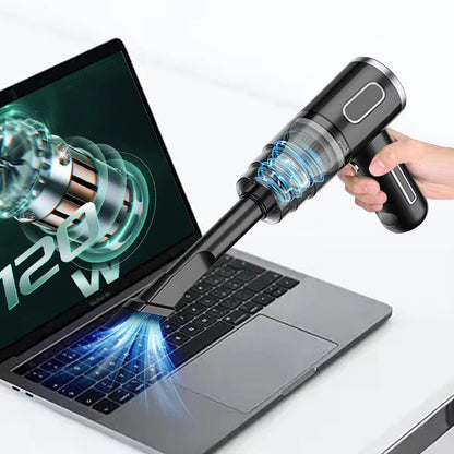 Black cordless vacuum cleaning laptop keyboard with 120W motor animation on laptop screen
