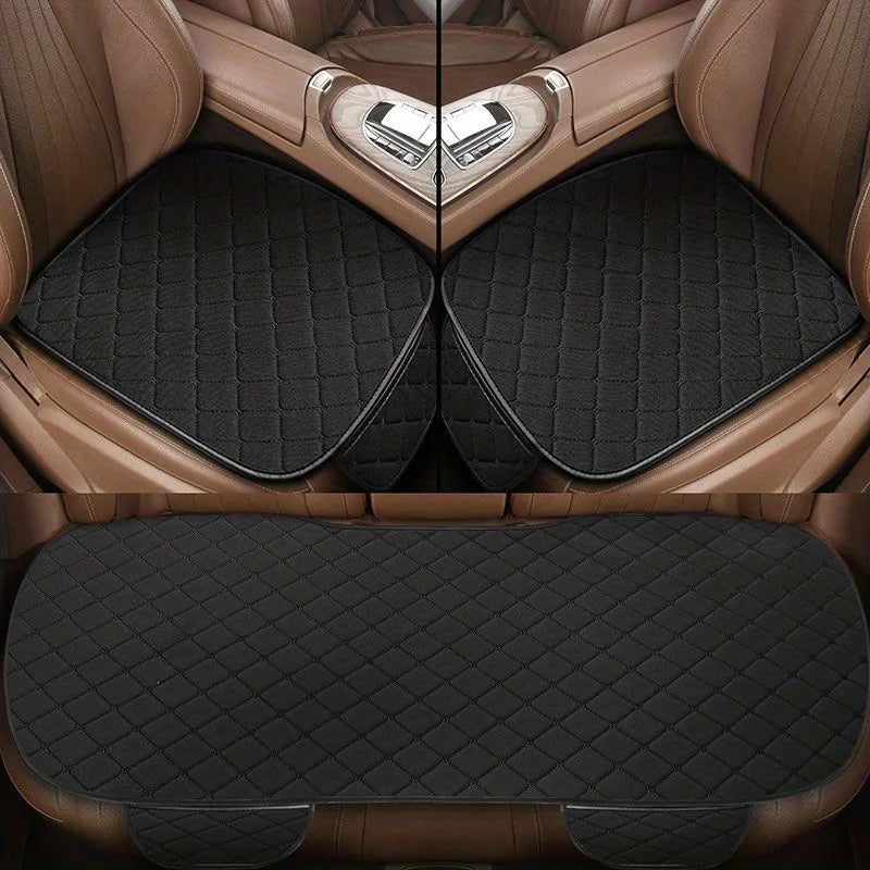 Black cotton linen 3-piece car seat cover set installed in car, top view of both front seats and rear bench