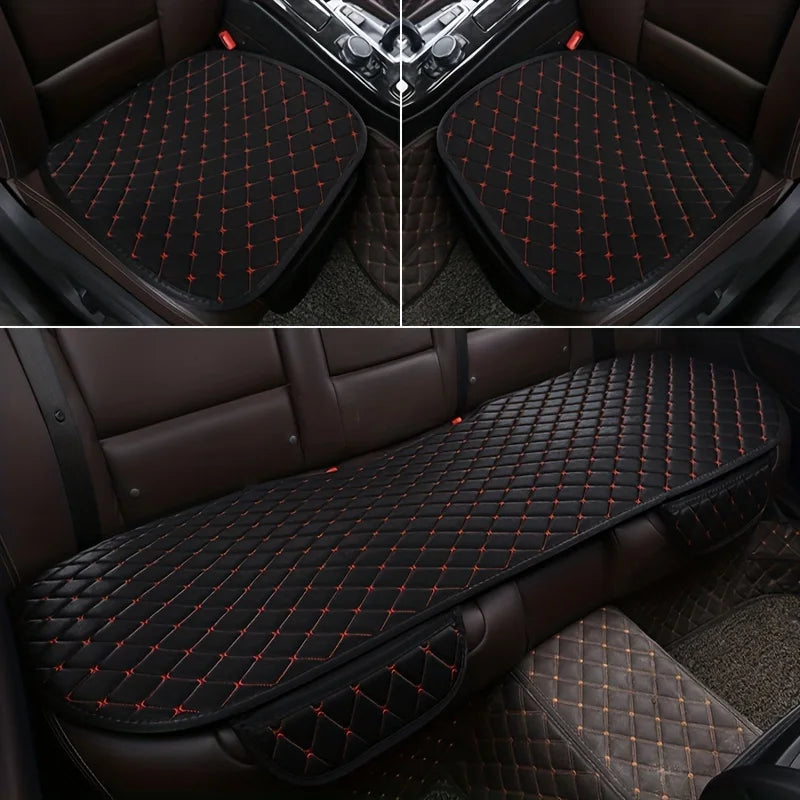 Black with red stitching 3-piece cotton seat cover installed in car showing both front seats and rear bench