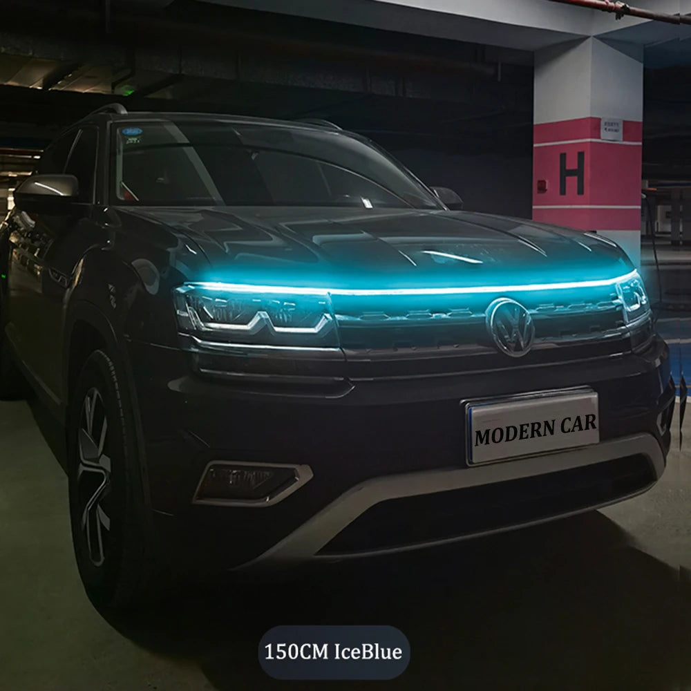 150CM ice blue dynamic LED DRL hood light strip glowing along front grille edge of VW Tiguan in car park