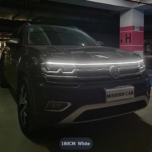 Dynamic LED hood light strip installed on car with flowing white effect