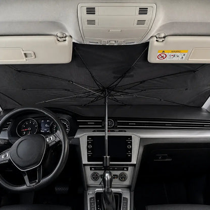 Foldable umbrella car windshield sunshade real-life installation inside Volkswagen showing full windshield coverage from inside cabin view with dashboard and steering wheel