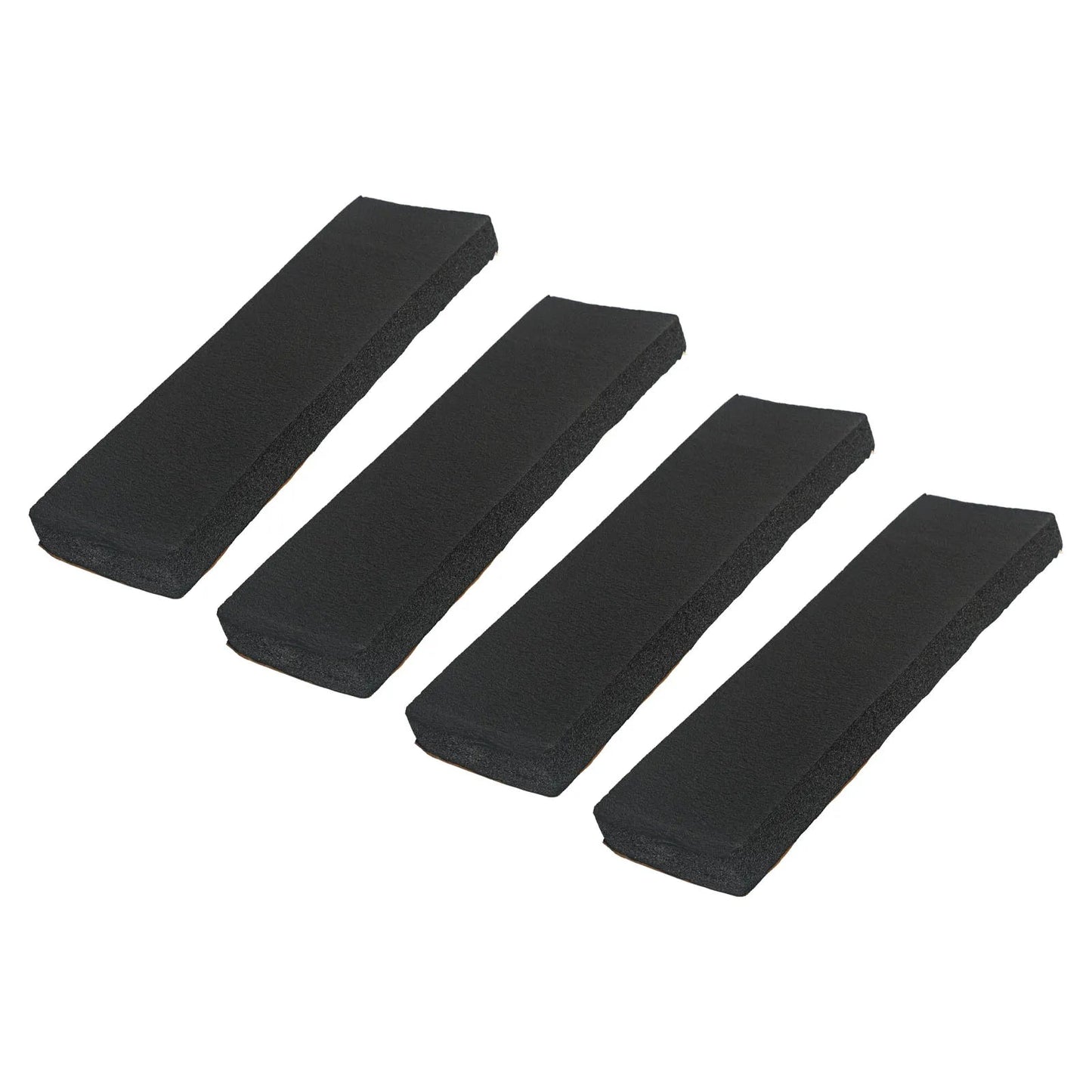 4 black foam garage wall bumper pads angled showing beveled edges and adhesive backing