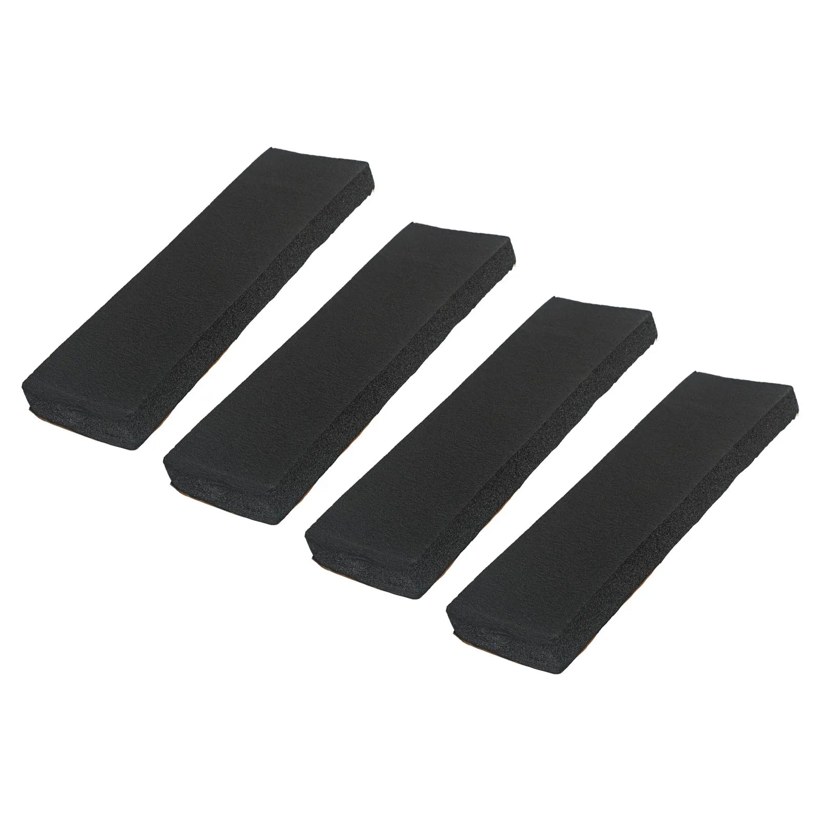 4 black foam garage wall bumper pads angled showing beveled edges and adhesive backing