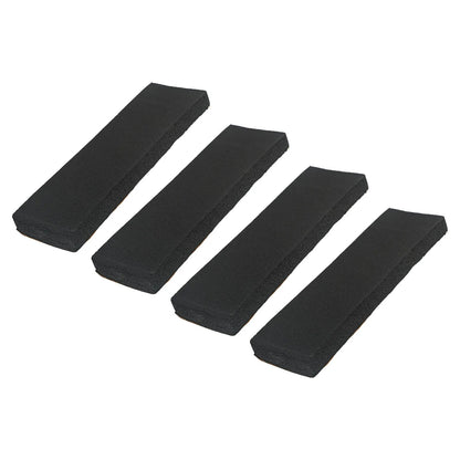 4 black foam garage wall bumper pads angled showing beveled edges and adhesive backing