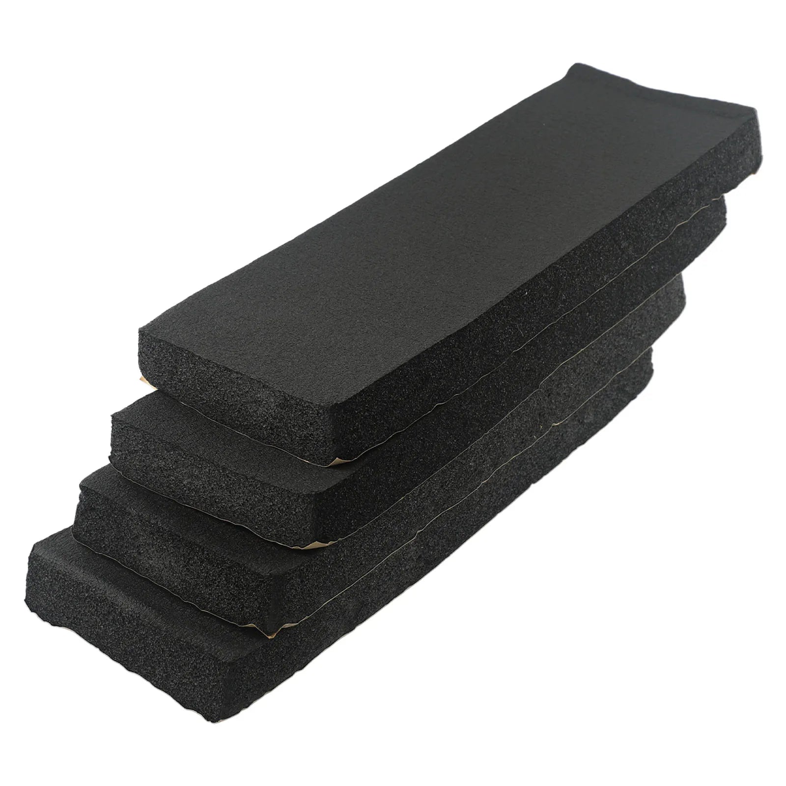 4 black foam garage wall bumper pads stacked showing thickness and foam texture