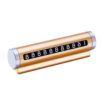 Golden metal car parking number plate with rotating digits for windshield display