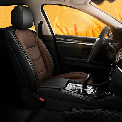 Brown heated car seat cushion single seat installed in car interior with warm golden autumn background