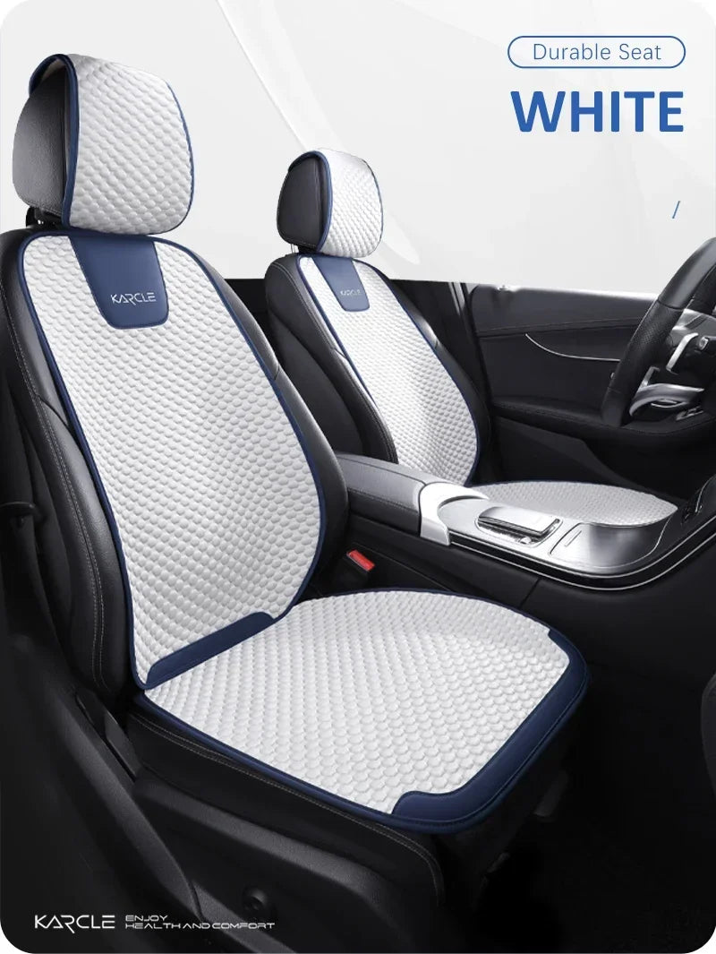 White ice silk car seat covers on rear backrests and bench mat installed in car interior