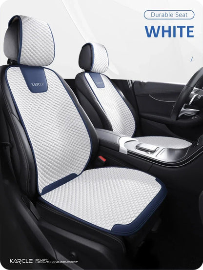 White ice silk car seat covers on rear backrests and bench mat installed in car interior