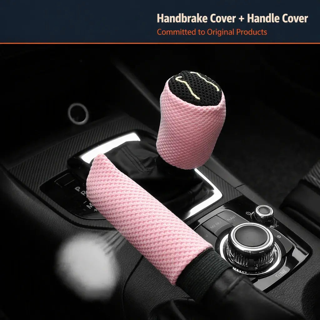 Pink ice silk breathable handbrake and gear shift cover 2pc set installed on car center console with dark interior and ambient lighting