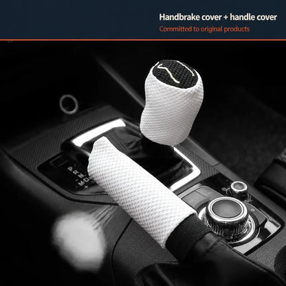 White ice silk breathable handbrake and gear shift cover 2pc set installed on car center console with dark interior and ambient lighting