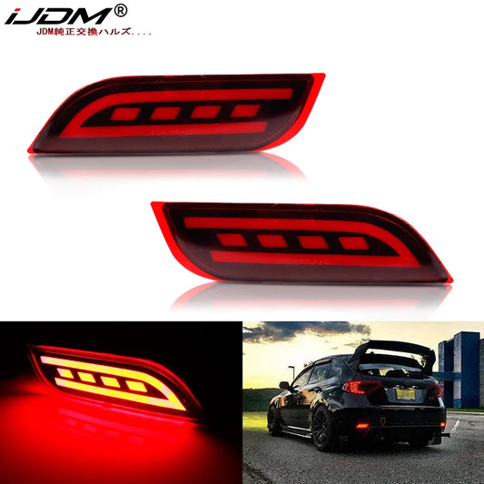 JDM-style red lens LED rear bumper reflectors shown lit and installed on a sport compact vehicle at night