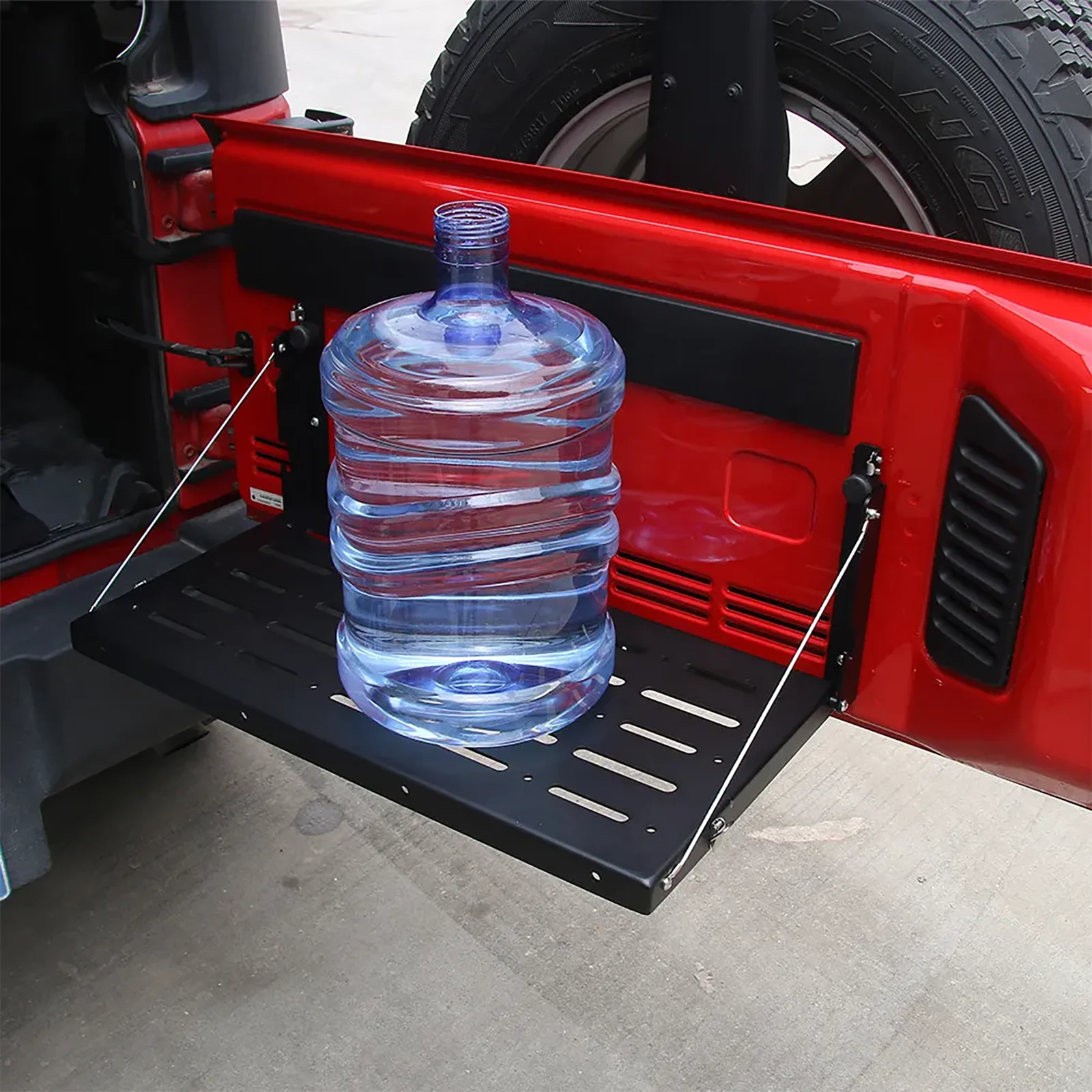 Installation kit contents for Jeep tailgate rack including screws and instructions