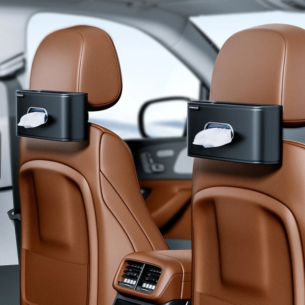 Leather tissue holder hanging from car headrest post on the seat back