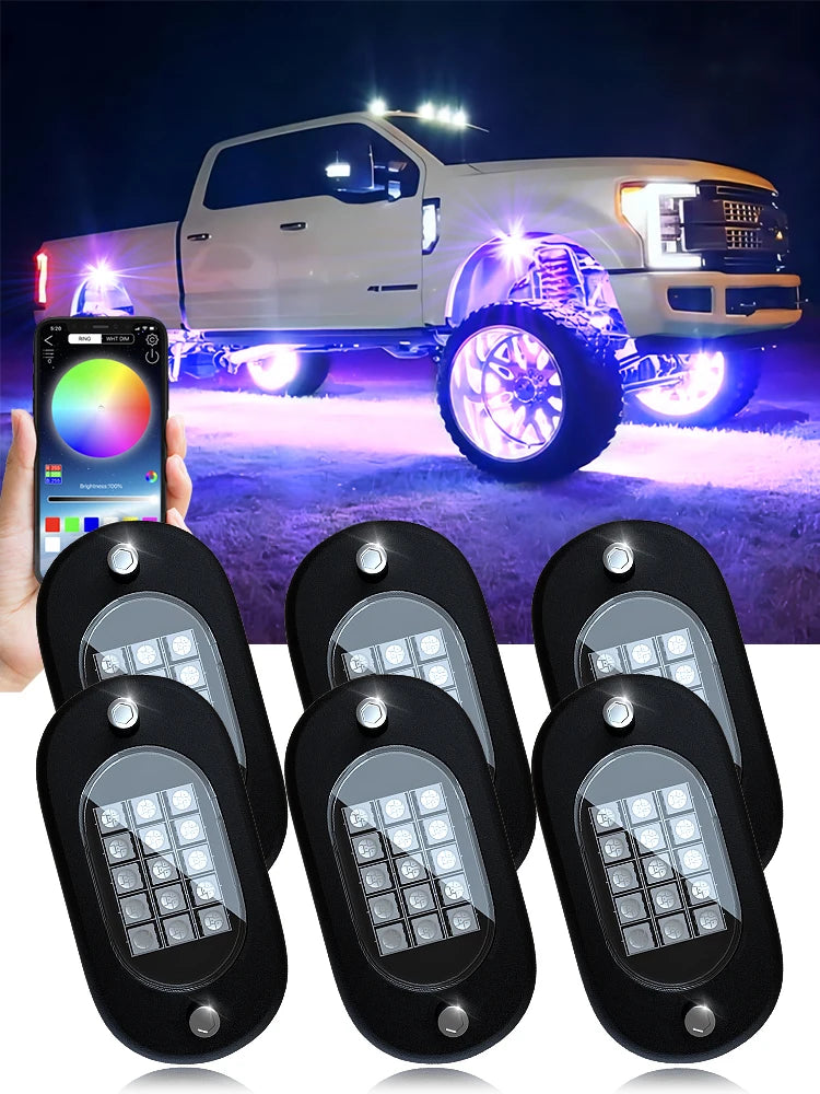 6-pod RGB rock lights kit with app — lifted truck with purple underglow