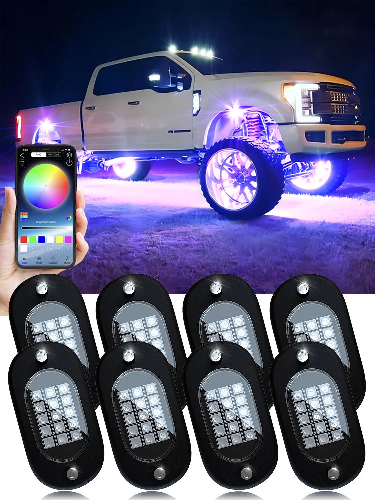 8-pod RGB rock lights kit with app — lifted truck with pink underglow
