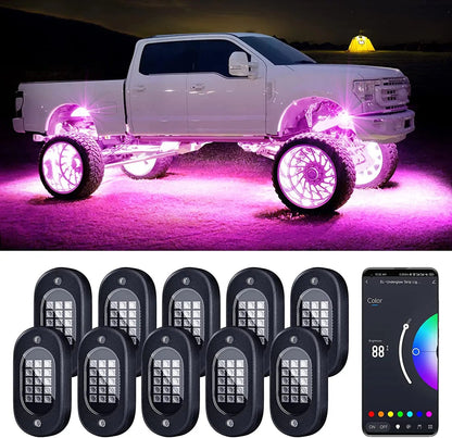 Lifted white truck with pink RGB underglow rock lights at night, 8-pod kit and app shown below
