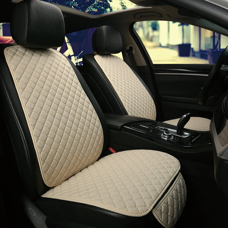 Linen car seat cover beige cream color installed on front seats